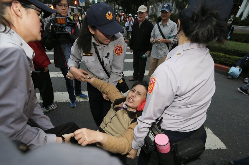 Protesters demonstrate against pension reform in Taipei